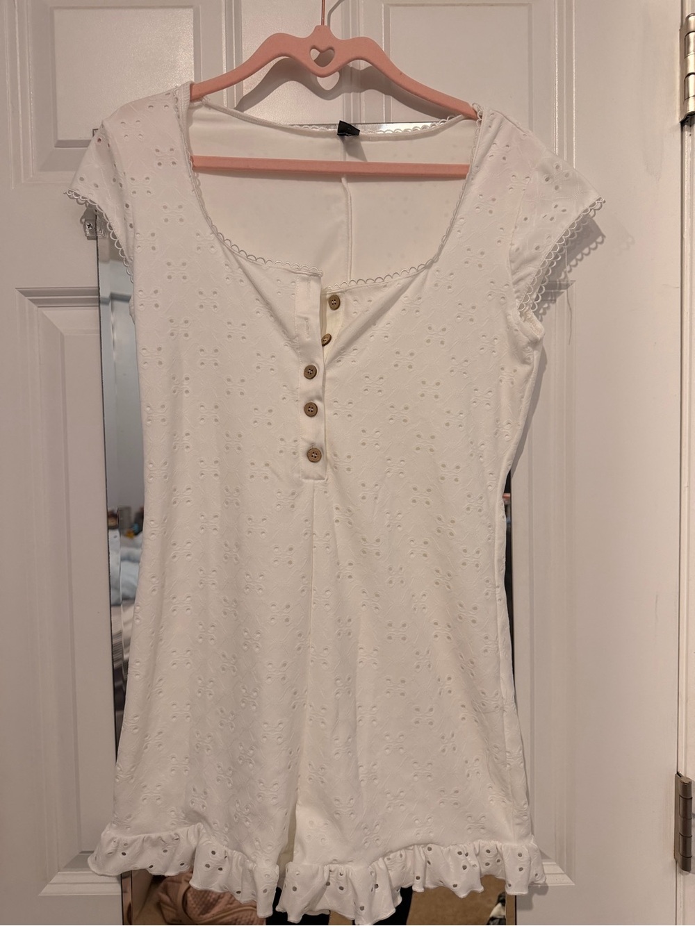 Never worn!! “Girl Next Door” White Eyelet Button-Front Ruffle-Hem romper size M
